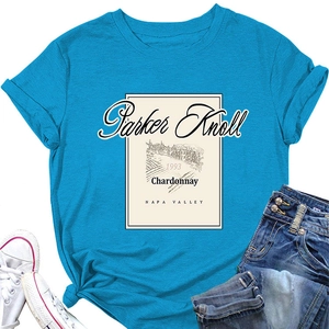 Detail view of teal Parker Knoll print T-shirt with vintage logo and front knot styling