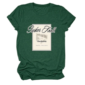 Close-up of vintage Parker Knoll 1993 print on a dark green melange cotton T-shirt