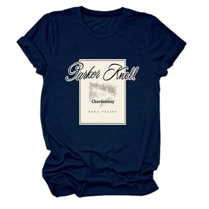 Detailed view of the vintage Parker Knoll 1993 wine label print on a navy cotton T-shirt