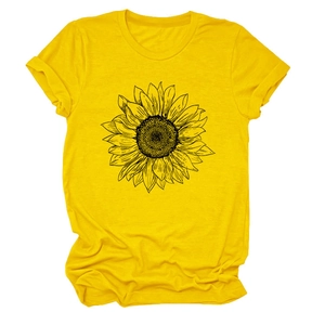 Détail du t-shirt jaune avec motif tournesol noir et texture en coton doux
