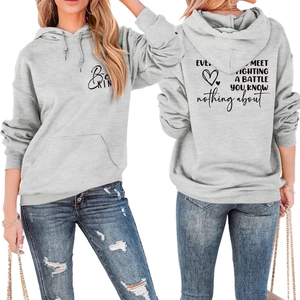 Front and back view of light grey hoodie featuring Be Kind and battle quote prints