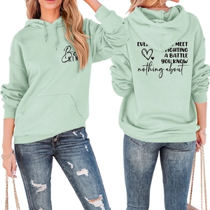 Front and back view of mint green hooded sweatshirt with inspirational Be Kind print