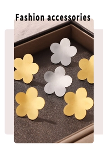 Detailed macro view of 18k gold and silver plated five-petal flower stud earrings