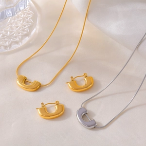 U-shaped gold and silver stainless steel jewelry set with necklace and earrings