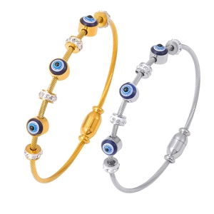 Brazalete retro ojo del diablo en oro y plata trenzado con diamantes brillantes