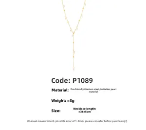 Detail of Y-shaped necklace with imitation pearls and 18k gold plated titanium steel chain
