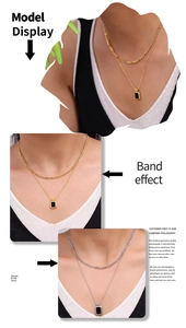 Detailed view of layered titanium steel necklaces with black square pendants in gold and silver