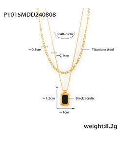 Macro detail of double-layer titanium steel necklace with black acrylic square pendant