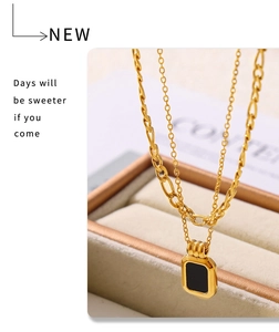 Detail of gold-plated double-layer necklace featuring a black rectangular acrylic pendant
