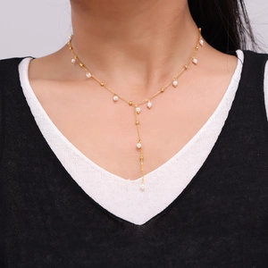 18k gold plated stainless steel Y-necklace with elegant pearl fringe on a model