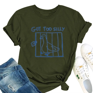 Flat lay of green cotton T-shirt with funny duck print and denim jeans outfit