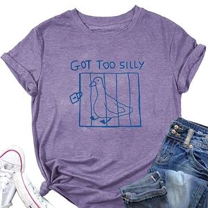 Detail of purple cotton t-shirt with silly duck graphic and casual crew neck finish
