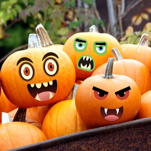 Halloween pumpkin face stickers with funny monster expressions for festive home decoration