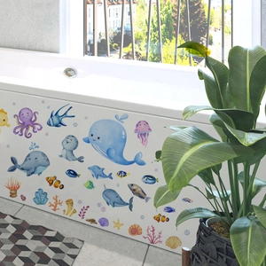 Macro view of ocean world whale bathtub stickers applied on a white surface