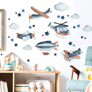Vinilos decorativos de aviones en acuarela con nubes azules y estrellas infantiles