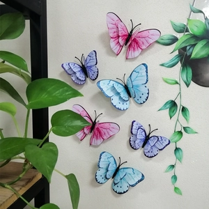 3D double-layered butterfly wall stickers in pink, purple, and blue for home decor