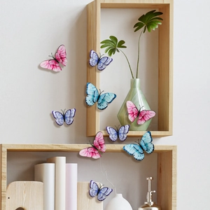Detail view of colorful 3D double-layer gradient butterfly wall stickers in home decor
