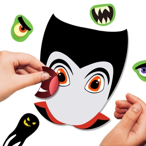 Detailed view of DIY Halloween vampire stickers being applied to create custom faces