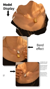 Détail du collier pendentif goutte d'eau plaqué or 18k avec une élégante chaîne serpent