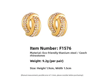 Macro view of 18k gold plated hollow twist earrings with crystal pavé and size specs