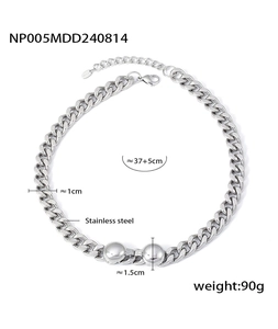 Close-up of silver Cuban chain necklace with dimensions 1cm width and 1.5cm mirror balls