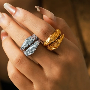Adjustable snake head open ring in gold and silver finish with detailed scale texture