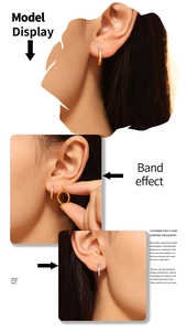 Macro detail of gold and silver hoop earrings with cubic zirconia pavé on model ears