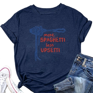 Flat lay of navy cotton T-shirt with spaghetti graphic paired with denim shorts and shoes