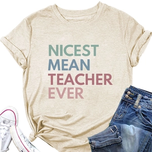 Flat lay of beige teacher t-shirt styled with denim jeans and canvas sneakers