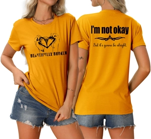 Détails recto-verso d'un t-shirt jaune avec impression graphique Beautifully Broken
