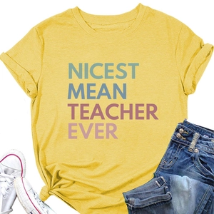 Flat lay of a yellow slogan t-shirt with denim jeans and white sneakers for styling