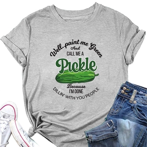 Close-up of funny green pickle graphic and slogan on grey cotton blend t-shirt