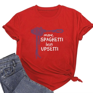 Detail of red T-shirt with 'more SPAGHETTI less UPSETTI' print and knotted hem