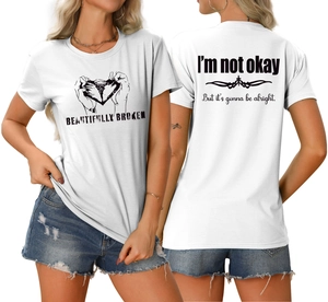 Vues avant et arrière d'un t-shirt blanc avec motif de cœur brisé et texte inspirant