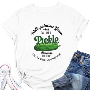 Flat lay of white cotton T-shirt featuring a green pickle graphic and humorous text slogan
