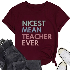 Flat lay of a burgundy cotton t-shirt with Nicest Mean Teacher Ever colorful text