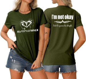 Vues avant et arrière du t-shirt vert foncé avec texte 'BEAUTIFULLY BROKEN' et graphisme