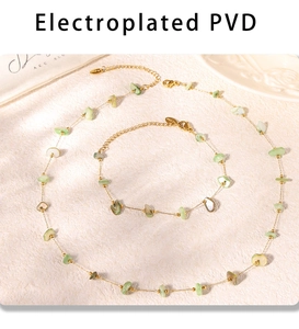 Detail of PVD plated gold jewelry set with natural green stone beads and texture