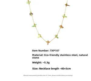 Detail of gold stainless steel necklace featuring irregular green and brown natural stones