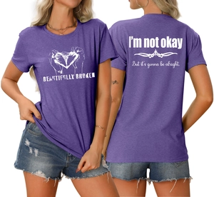Vue détaillée avant et arrière du t-shirt violet avec graphique et slogan de motivation