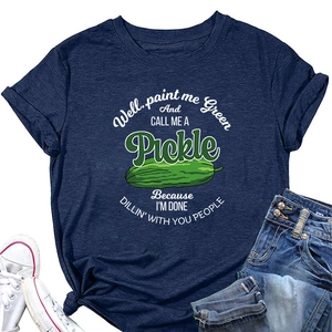 Detailed view of dark blue cotton T-shirt with humorous green pickle print and typography