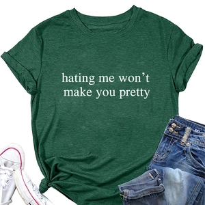 Detail of dark green cotton T-shirt featuring a front slogan and knotted hem design