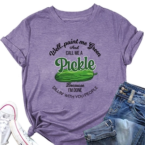 Detailed flat lay of purple heather T-shirt with green pickle graphic and funny quote