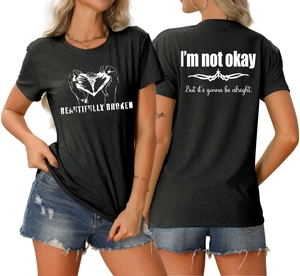 T-shirt noir à col rond avec texte 'Beautifully Broken' et imprimé au dos