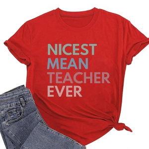 Detail of red crew neck T-shirt with Nicest Mean Teacher Ever print and knotted hem finish