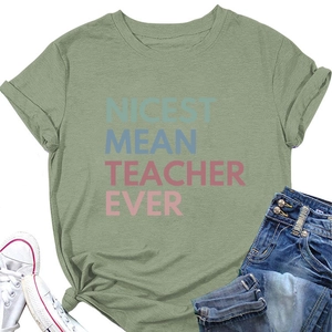 Detail of green T-shirt with 'NICEST MEAN TEACHER EVER' print and rolled sleeves