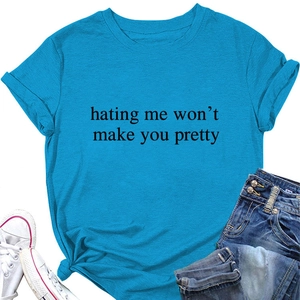 Detail of the sky blue cotton T-shirt featuring hating me won't make you pretty print