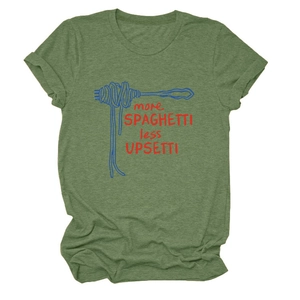 Detailed close-up of grass green cotton T-shirt with spaghetti graphic print and rolled sleeves