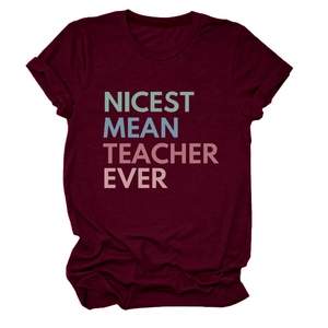 Detail of burgundy T-shirt showing NICEST MEAN TEACHER EVER text with gradient colors