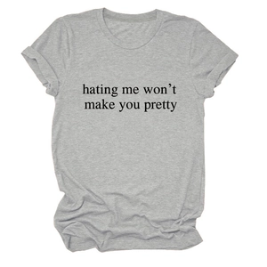 Close-up of crew neck and slogan print on light grey cotton short sleeve T-shirt